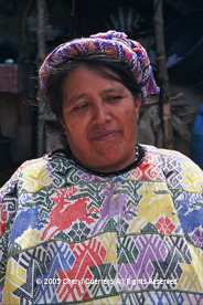 Unique traje or clothing is still in evidence outside of "Xela" or Quetzaltenango, the second largest city in Guatemala.  This Concepción woman both sells and wears her back strap weavings, and has taught all her daughters to do the same.  Photo by Cheryl Guerrero 2005.