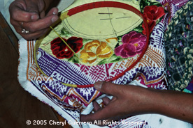 Embroidery, both by hand and machine, is popular throughout the highlands.  This hand embroidery is from the Guipil de Nebáj workshop in San Juan Ostuncalco.  Photo by Cheryl Guerrero 2005.