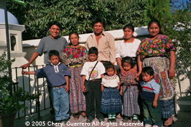 Driver and guide Fernando Pichiyà (left) is pictured with his extended family from Patzicía.  Photo by Cheryl Guerrero 2005.