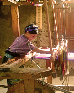Manuela's family has a large floor loom and a small belt loom in their home on Lake Atitlán.  The large loom was originally used by Manuela's late father.  Photo by Kathleen Mossman Vitale 2005.
