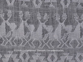 Picb'il design of deer made by supplementary weft brocade on a spaced or gauze weave textile on a backstrap loom.