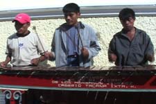 Most men in Guatemala, whether self-identified as Maya or not, now wear western dress, like these musicians performing in San Ildefonso Ixtahuacán.  Photo by Kathleen Mossman Vitale 2005.