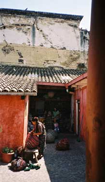 Culibrí, an upscale shop in Antigua that sells back strap and floor loomed products, has a rigid system of quality control.  Selected groups of indigenous weavers bring in their work to be checked, and return home with thread and instructions for additional products, like placemats and coasters.  Photo by Margot Blum Schevill 2005.